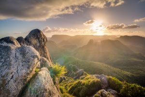 Sunrise over a misty mountain range