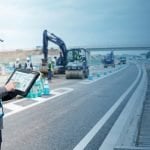 Civil engineer reviewing construction plans
