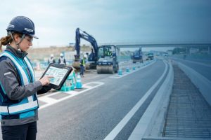 Civil engineer reviewing construction plans
