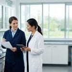 Scientists reviewing a certification report
