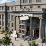 Tilt-shift miniature of an institutional building having two old signs replaced with a single new one, while people continue to come and go